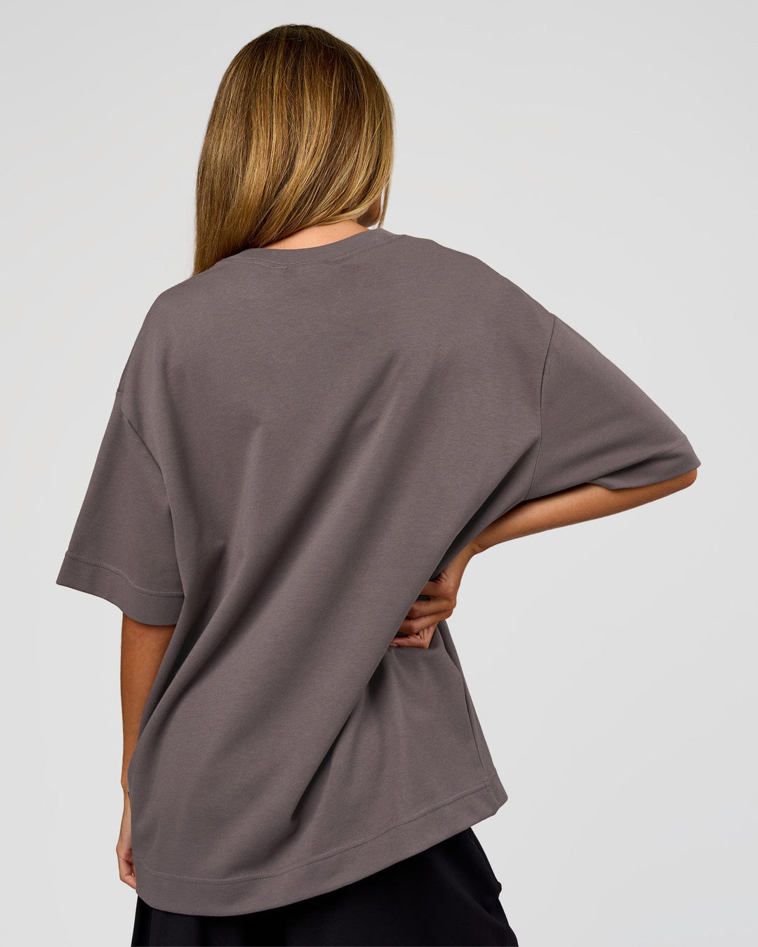 Woman wearing AfterDark ZeroCrease Oversized Tee - Duskstone | Model:Georgia | Size:XS