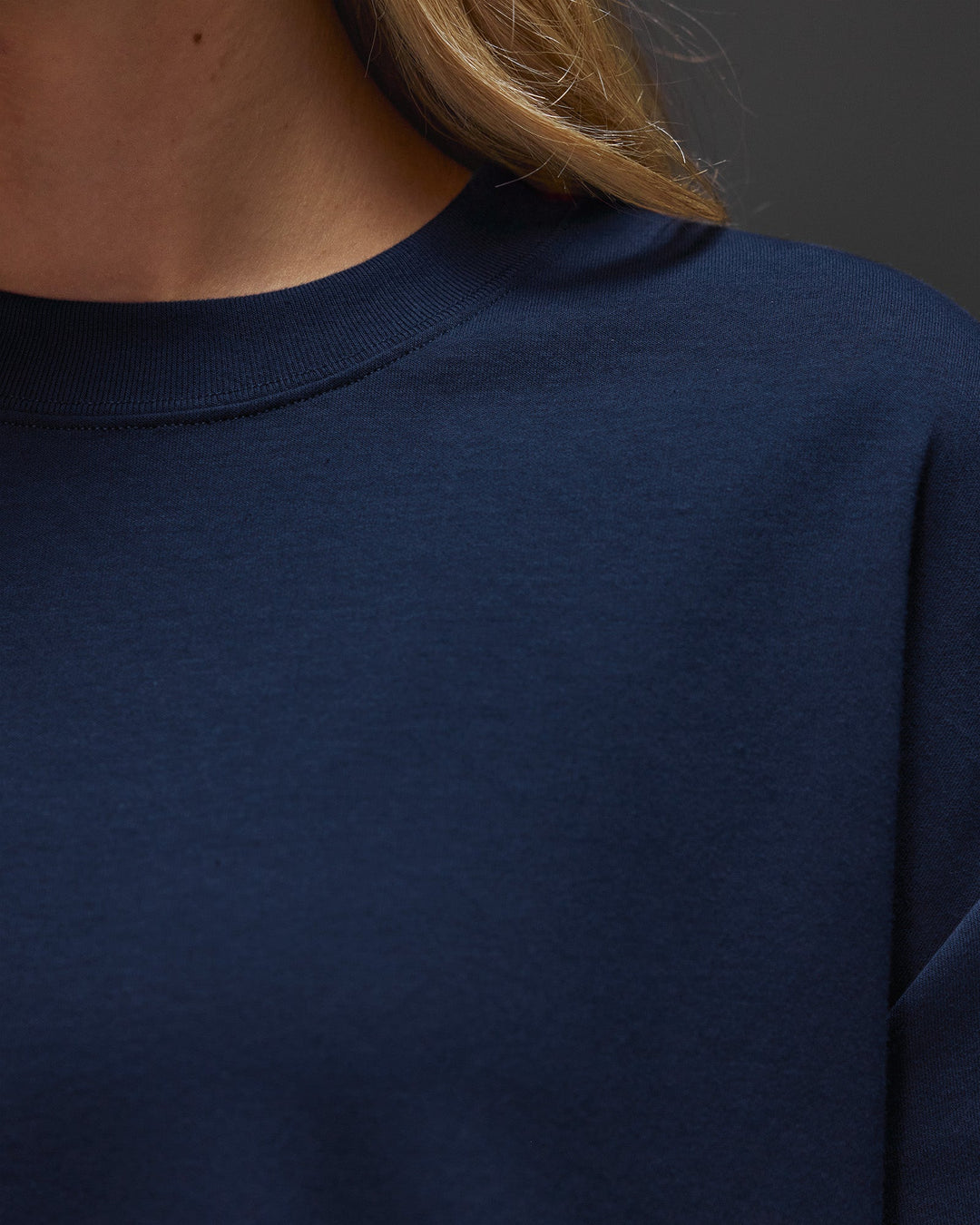 Woman wearing AfterDark ZeroCrease Oversized Tee - Future Navy | Model:Leilani | Size:XS