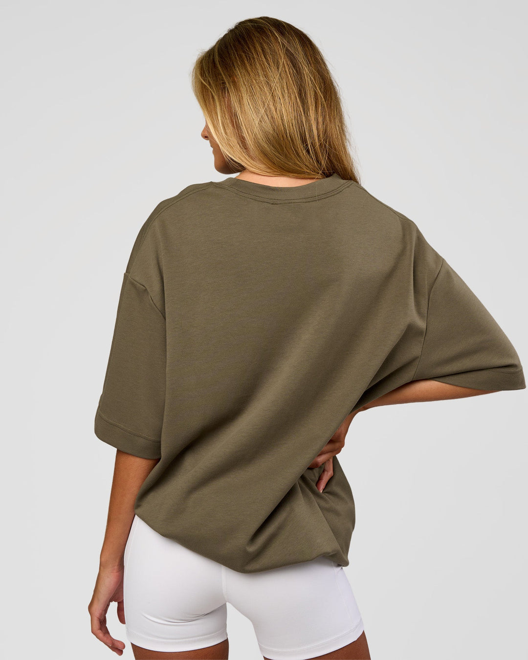 Woman wearing AfterDark ZeroCrease Oversized Tee - Walnut Grey | Model:Georgia | Size:XS