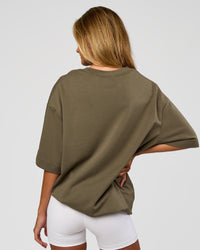 Woman wearing AfterDark ZeroCrease Oversized Tee - Walnut Grey | Model:Georgia | Size:XS