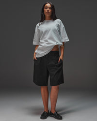 Woman wearing AfterDark ZeroCrease Oversized Tee - White | Model:Ruby | Size:XS