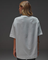 Woman wearing AfterDark ZeroCrease Oversized Tee - White | Model:Leilani | Size:XS