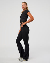 Woman wearing All Day Short Sleeve Tee - Black | Model:Emelia | Size:XS