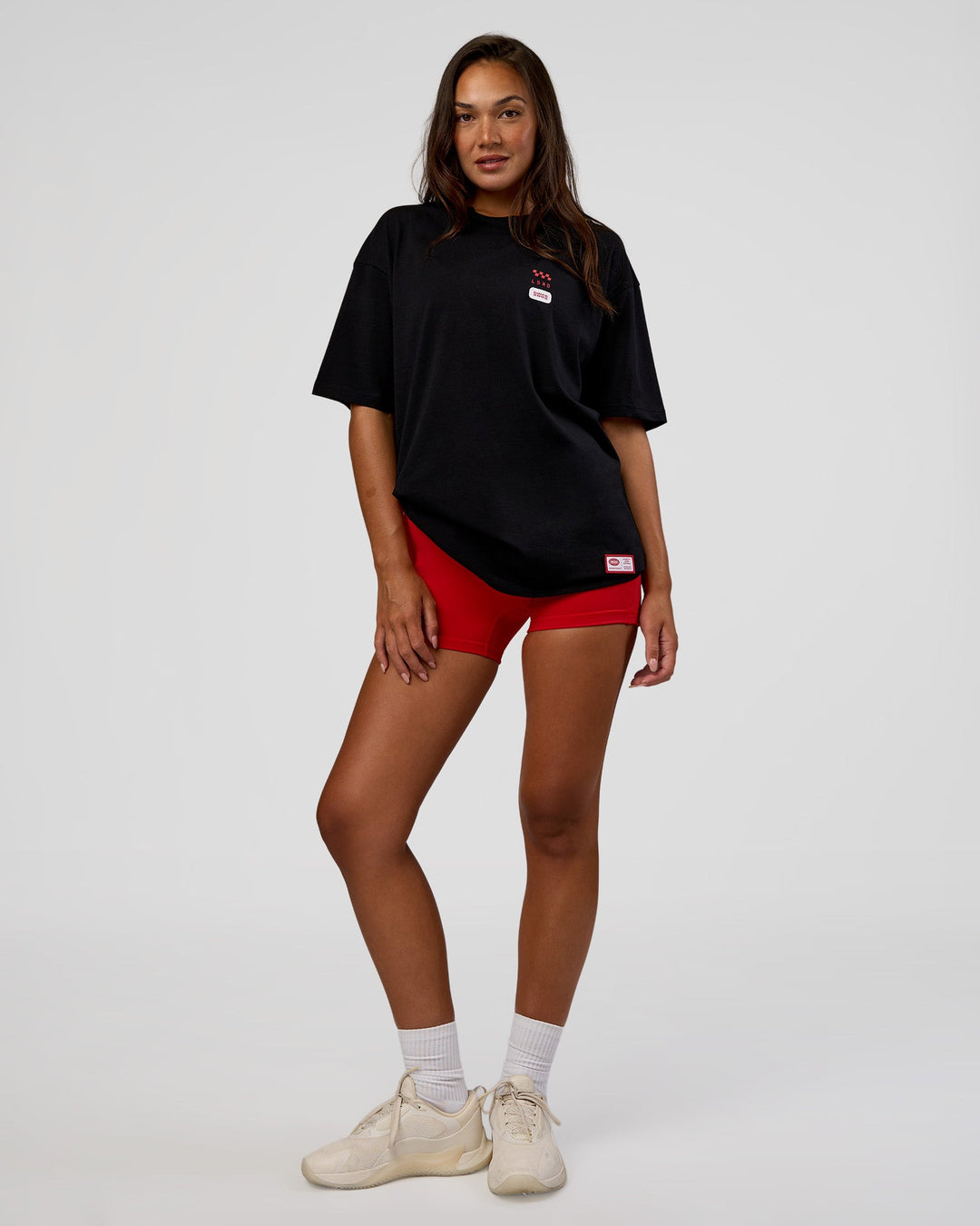 Woman wearing Archive FLXCotton Oversized Tee - Black-Scarlet | Model:Kirstyn | Size:XS