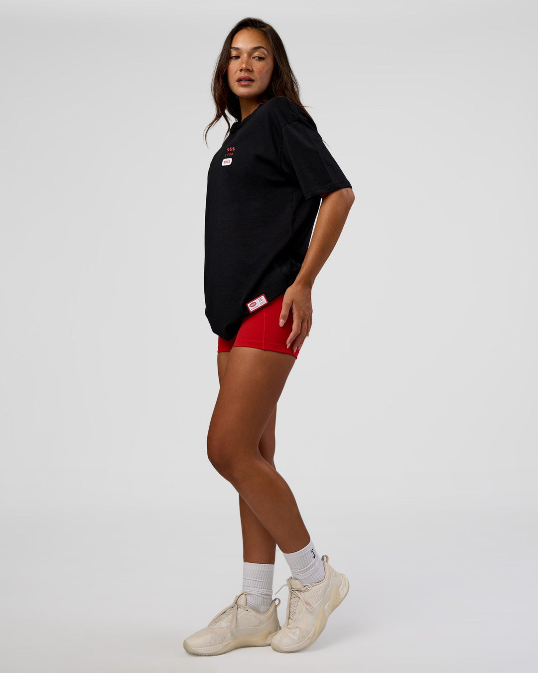 Woman wearing Archive FLXCotton Oversized Tee - Black-Scarlet | Model:Kirstyn | Size:XS