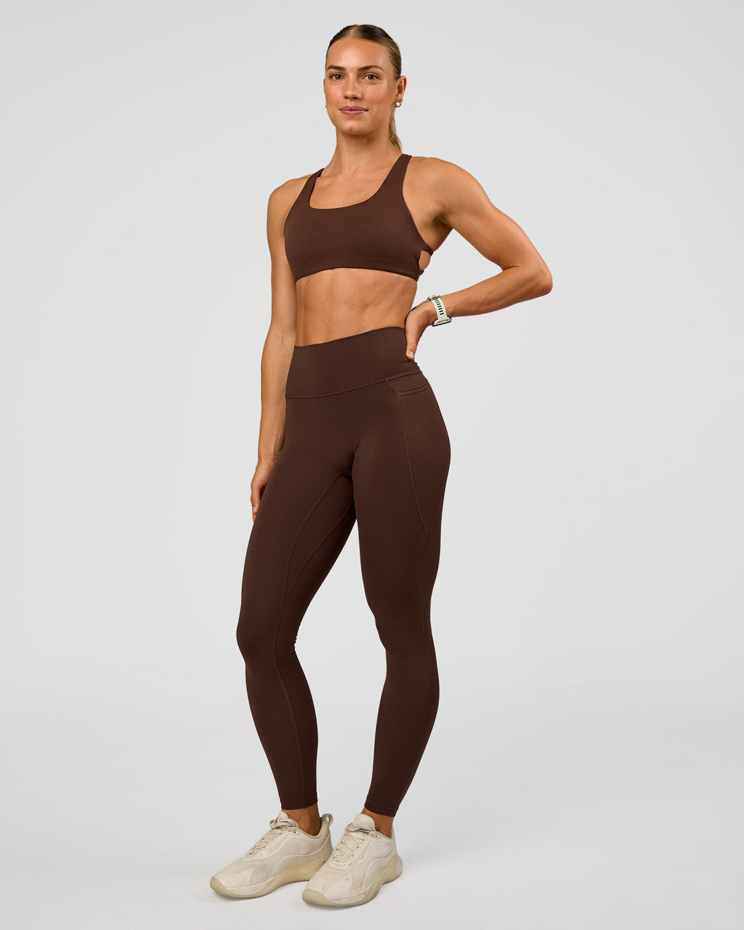 Woman wearing Aspire Sports Bra - Hot Chocolate | Model:Maja | Size:XS - view 5