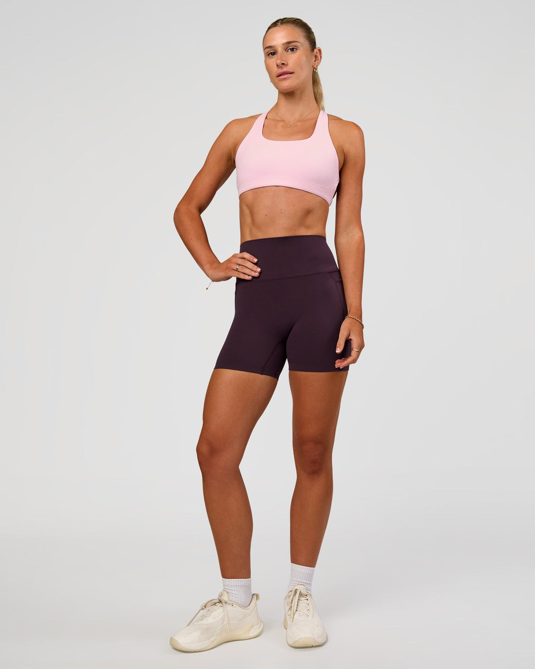 Woman wearing Aspire Sports Bra - Marshmallow | Model:Emelia | Size:XS