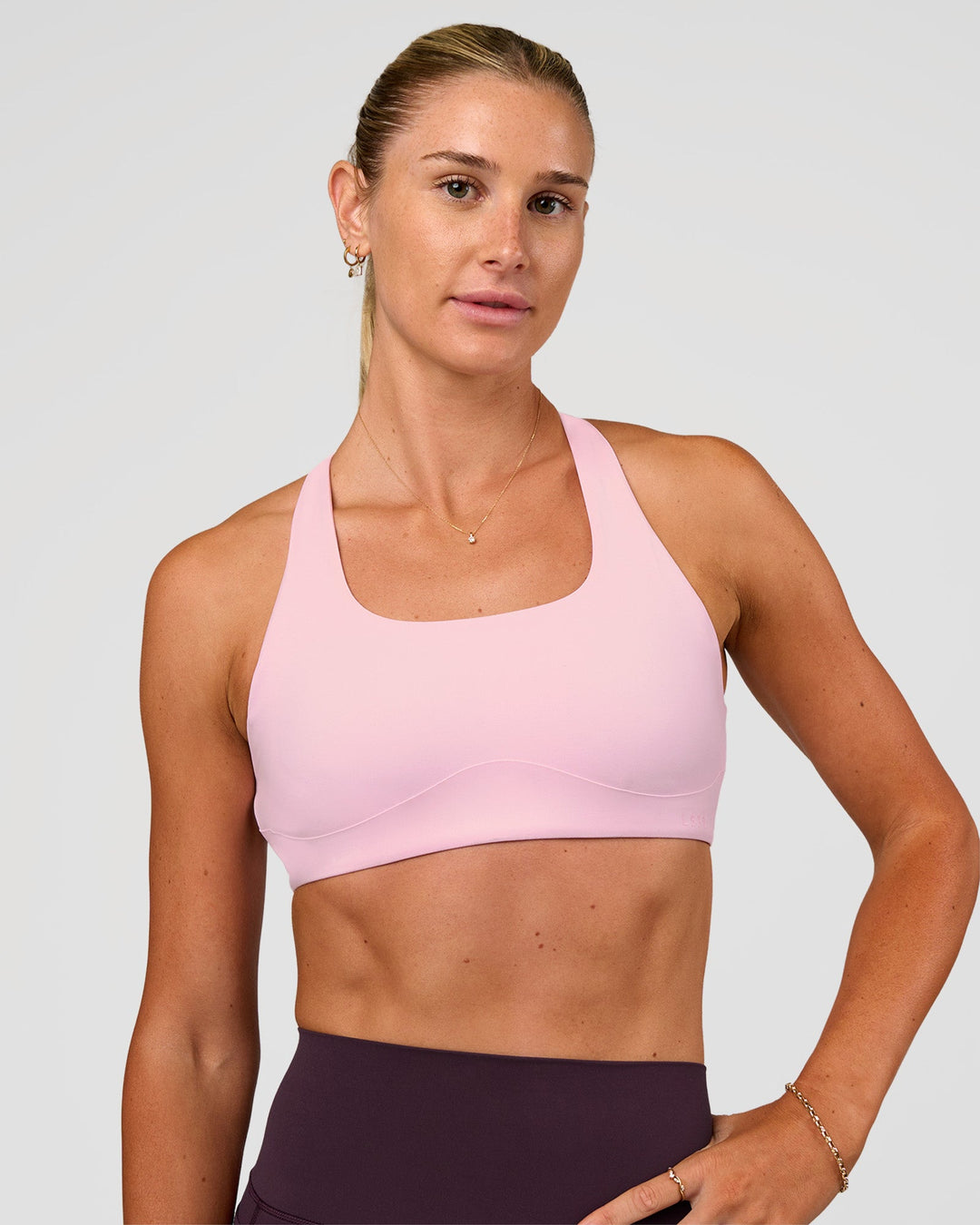 Woman wearing Aspire Sports Bra - Marshmallow | Model:Emelia | Size:XS