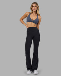 Woman wearing Aspire Twist Sports Bra - Night Shadow | Model:Leilani | Size:XS | Thumbnail Index: 6