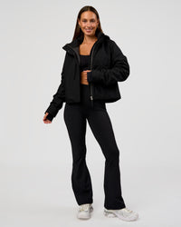 Woman wearing Auxiliary 2.0 Jacket - Black | Model:Brylee | Size:XS