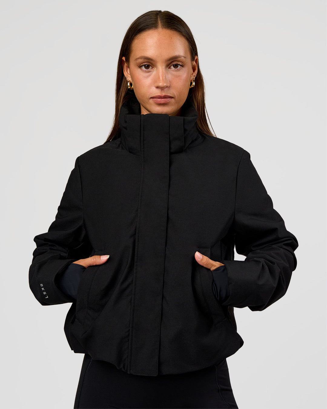 Woman wearing Auxiliary 2.0 Jacket - Black | Model:Brylee | Size:XS