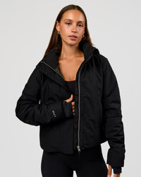 Woman wearing Auxiliary 2.0 Jacket - Black | Model:Brylee | Size:XS