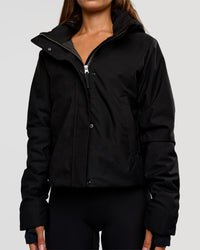 Woman wearing Auxiliary 2.0 Jacket - Black | Model:Brylee | Size:XS