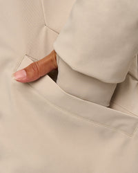 Woman wearing Auxiliary 2.0 Longline Jacket - Shale Beige | Model:Brylee | Size:XS