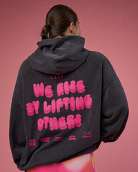 Woman wearing BCAM Washed Unisex Oversized Hoodie - Black Washed-Pink | Model:Hannah | Size:XS