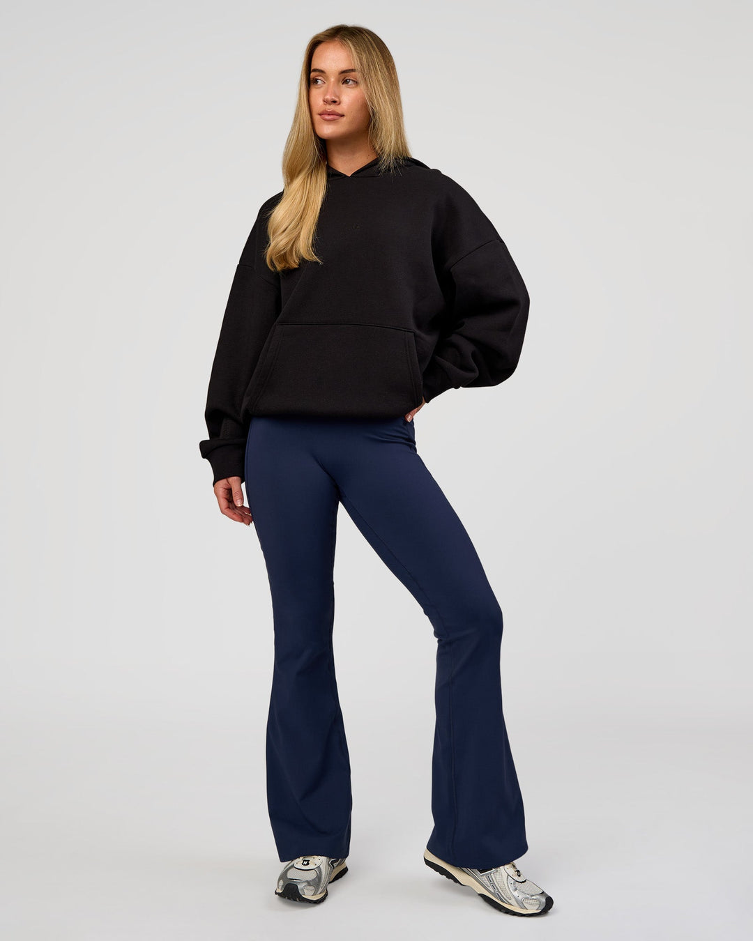 Woman wearing Base Oversized Hoodie - Black | Model:Issy | Size:XS | - view 12