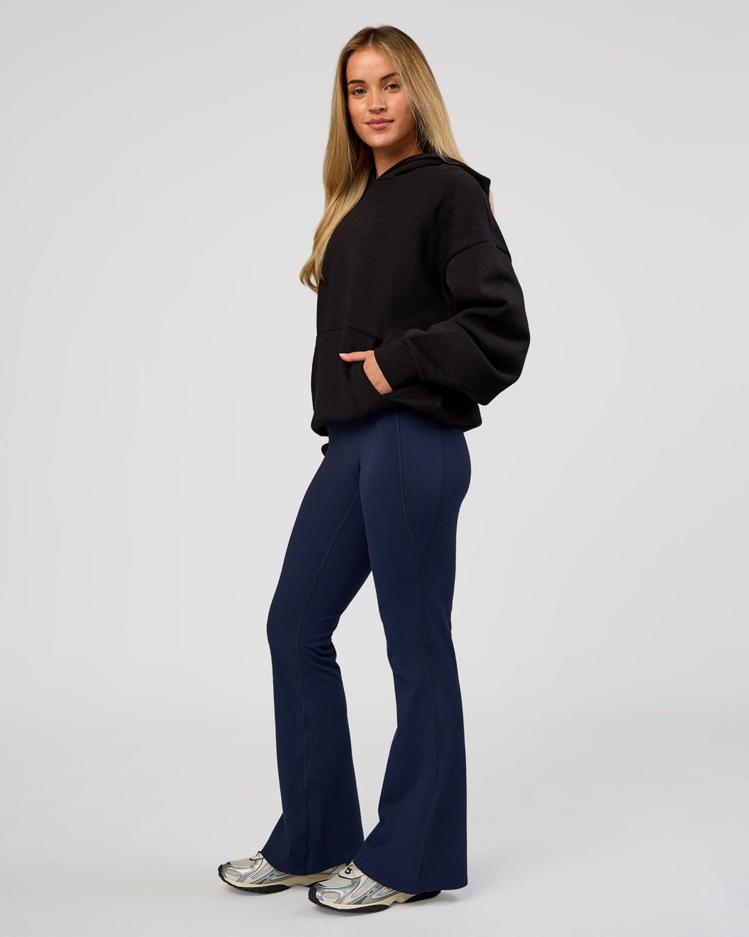 Woman wearing Base Oversized Hoodie - Black | Model:Issy | Size:XS | - view 10