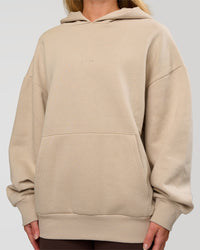 Woman wearing Base Oversized Hoodie - Shale Beige | Model:Issy | Size: XS | | Thumbnail Index: 7