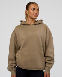 Woman wearing Base Oversized Hoodie - Taupe Ash | Model:Maja | Size:XS | Thumbnail Index: 2