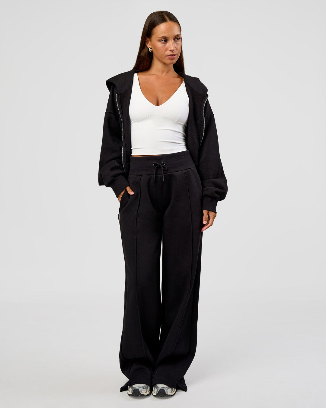 Woman wearing Base Zip Through Oversized Hoodie - Black | Model:Brylee | Size:XS