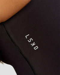Woman wearing Bend & FLX Plunge Tank - Black | Model:Brylee | Size:XS | Thumbnail Index: 7