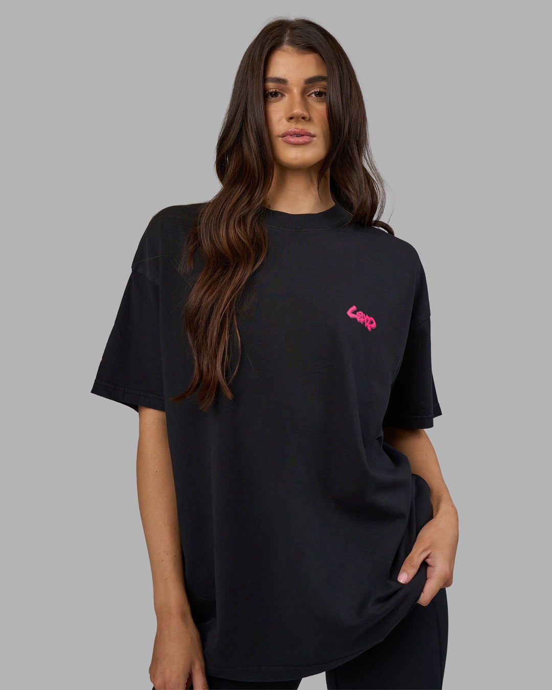 Woman wearing Break Through Heavyweight Oversized Tee - Black Washed-Plum Caspia | Model:Phoebe | Size:XS
