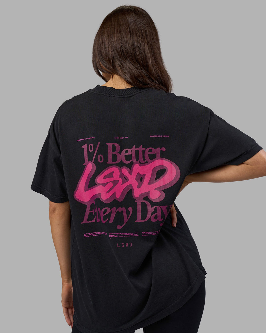 Woman wearing Break Through Heavyweight Oversized Tee - Black Washed-Plum Caspia | Model:Phoebe | Size:XS