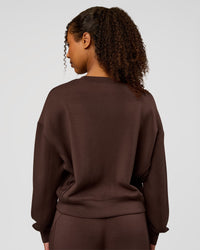 Woman wearing CF Elevate SoftTouch Pintuck Sweater - Hot Chocolate | Model:Jordan | Size:XS