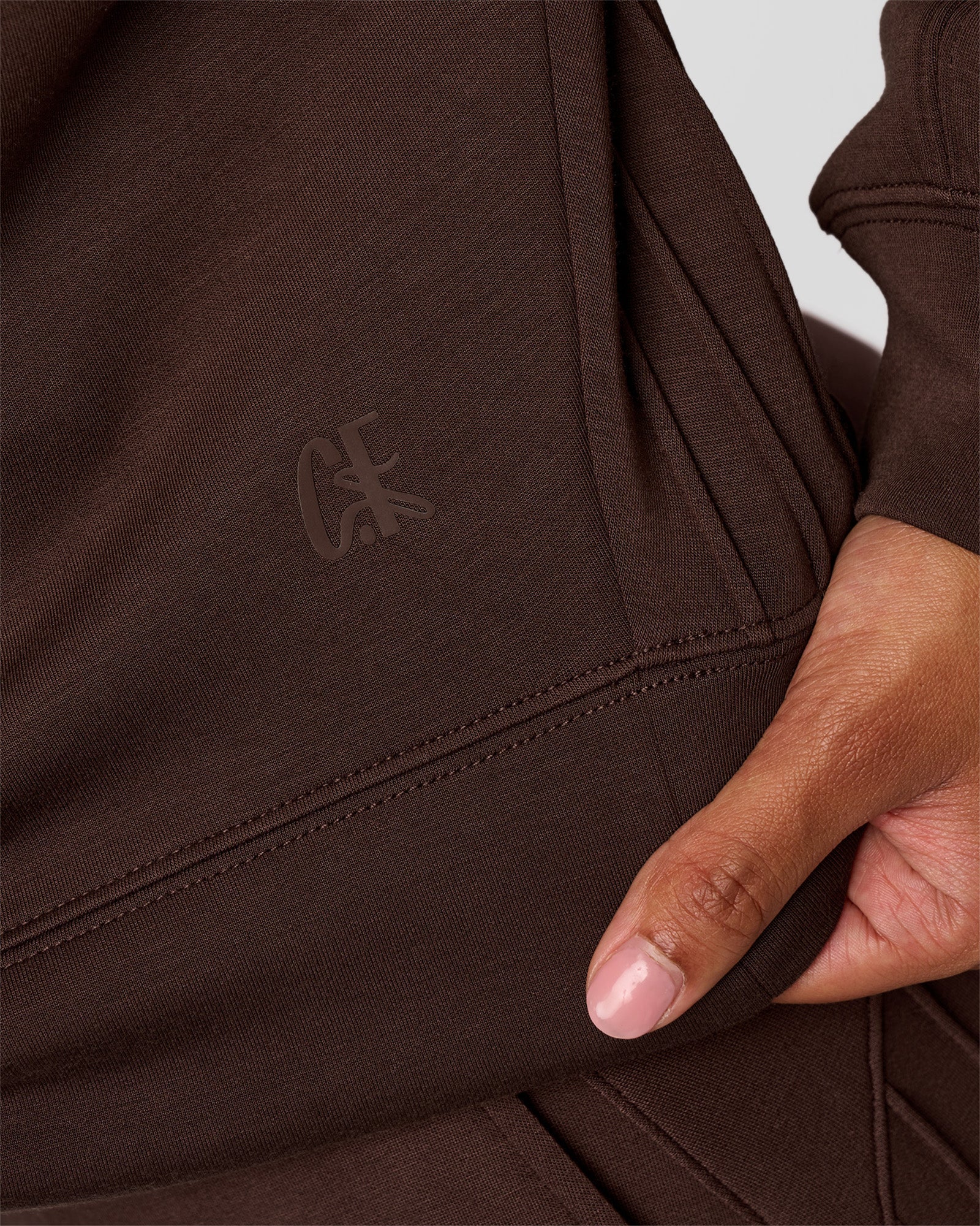 Woman wearing CF Elevate SoftTouch Pintuck Sweater - Hot Chocolate | Model:Jordan | Size:XS