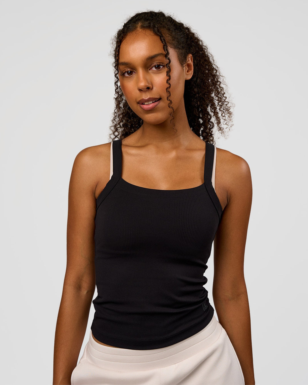 Woman wearing CF Move Through It Rib Tank - Black | Model:Jordan | Size:XS