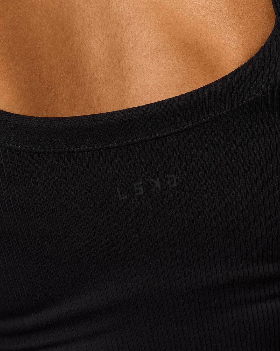 Woman wearing CF Move Through It Rib Tank - Black | Model:Jordan | Size:XS