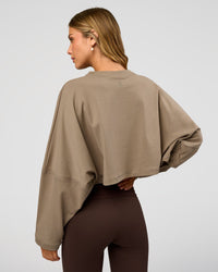 Woman wearing CF Street Surge Long Sleeve Tee - Taupe Ash | Model:Leilani | Size:XS