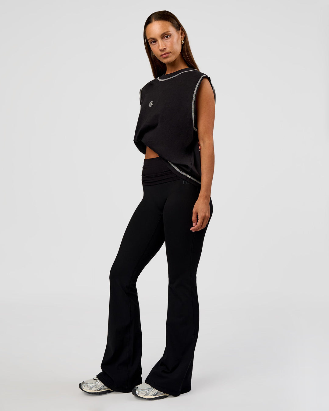 Woman wearing CF Unisex Oversized Heavyweight Boxed Tank - Black-CF X LSKD Sport | Model:Brylee | Size:XS