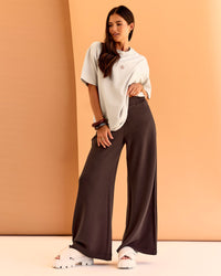 Woman wearing CF Unisex Oversized Heavyweight FLXCotton Tee - Clay-CF X LSKD Sport | Model:Chloe | Size:XS