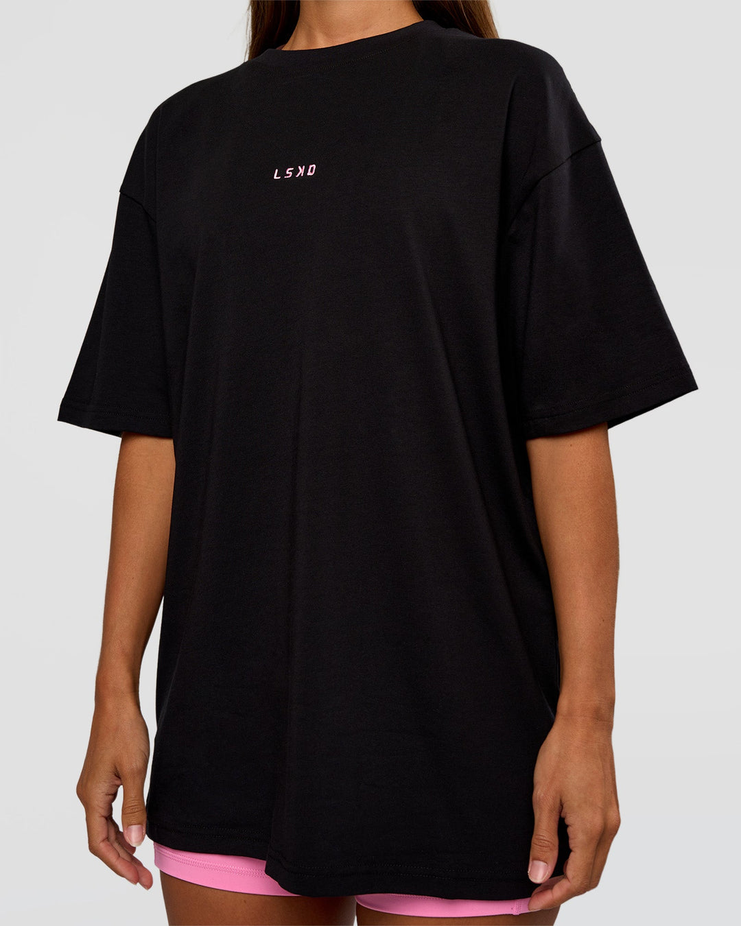 Woman wearing CFT BNE 26 FLXCotton Oversized Tee in Black | Model:Brylee | Size:XS - view 11