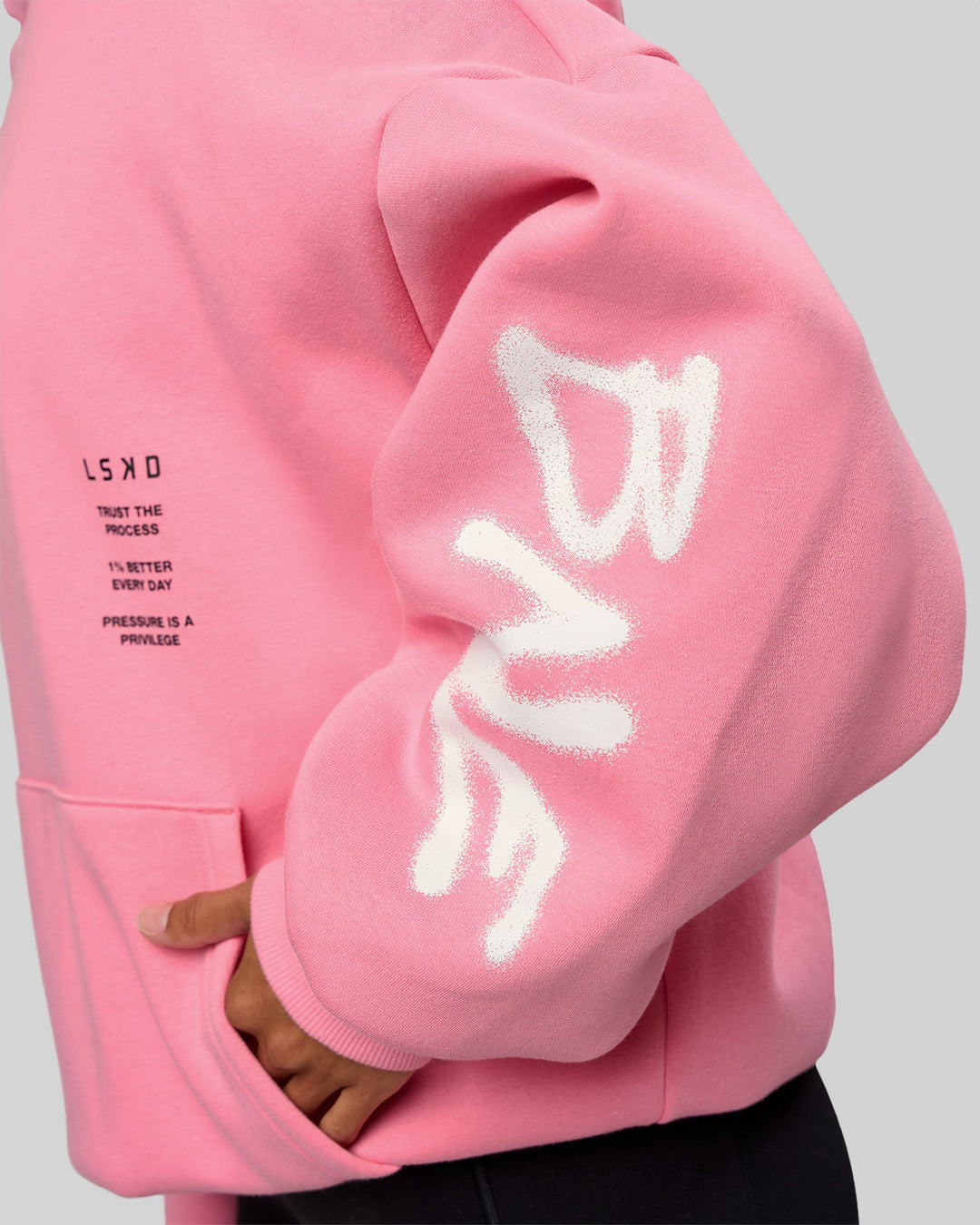 Woman wearing CFT BNE 26 Unisex Oversized Hoodie - Candy Pink-Black | Model:Brylee | Size:XS