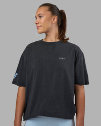 Woman wearing Cali FLXCotton Oversized Tee - Black Washed | Model:Charlize | Size:XS