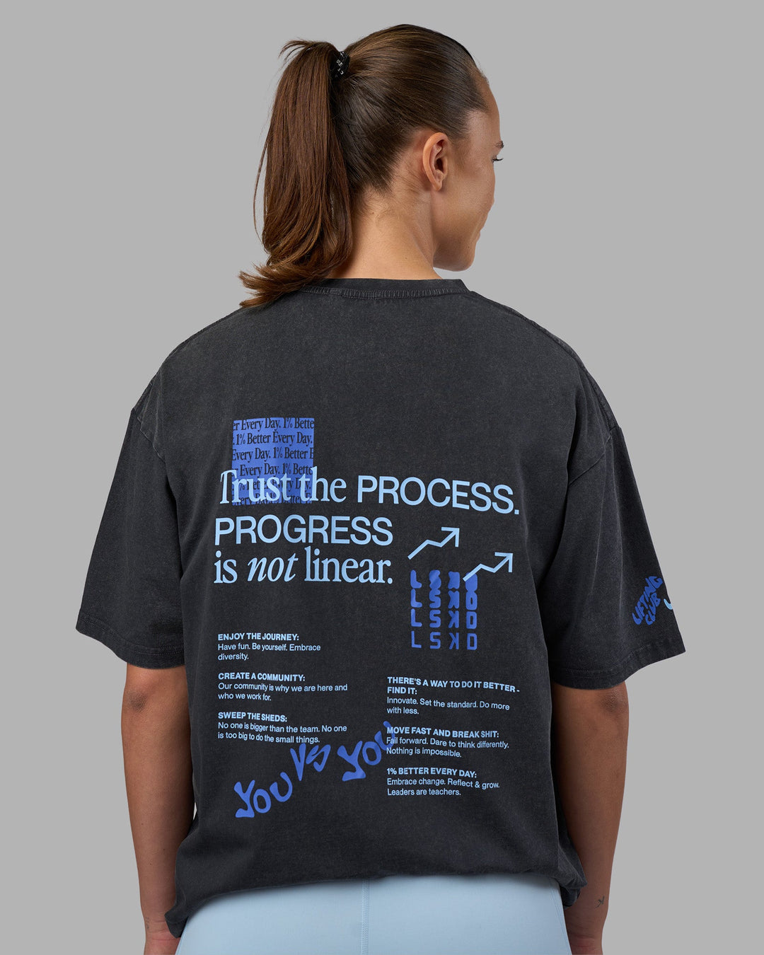 Woman wearing Cali FLXCotton Oversized Tee - Black Washed | Model:Charlize | Size:XS