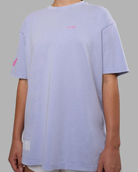 Woman wearing Cali FLXCotton Oversized Tee - Sweet Lavender Washed | Model:Charlize | Size:XS