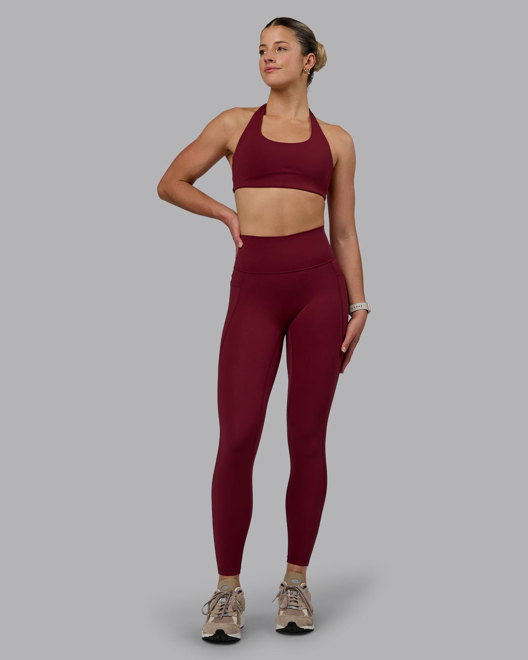 Woman wearing Challenger Sports Bra - Cordovan