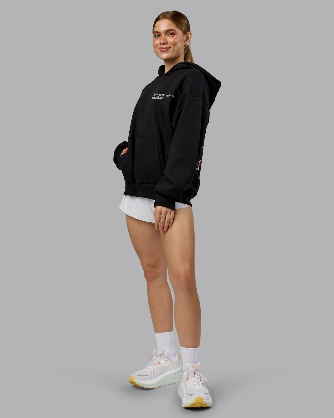 Woman wearing Checklist Oversized Hoodie - Black | Model:Emilie | Size:XS