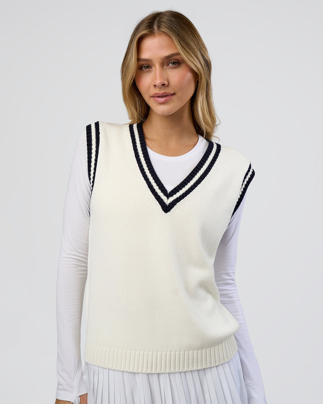 Woman wearing Clubhouse Vest - Off White-Future Navy | Model:Leilani | Size:XS - view 2