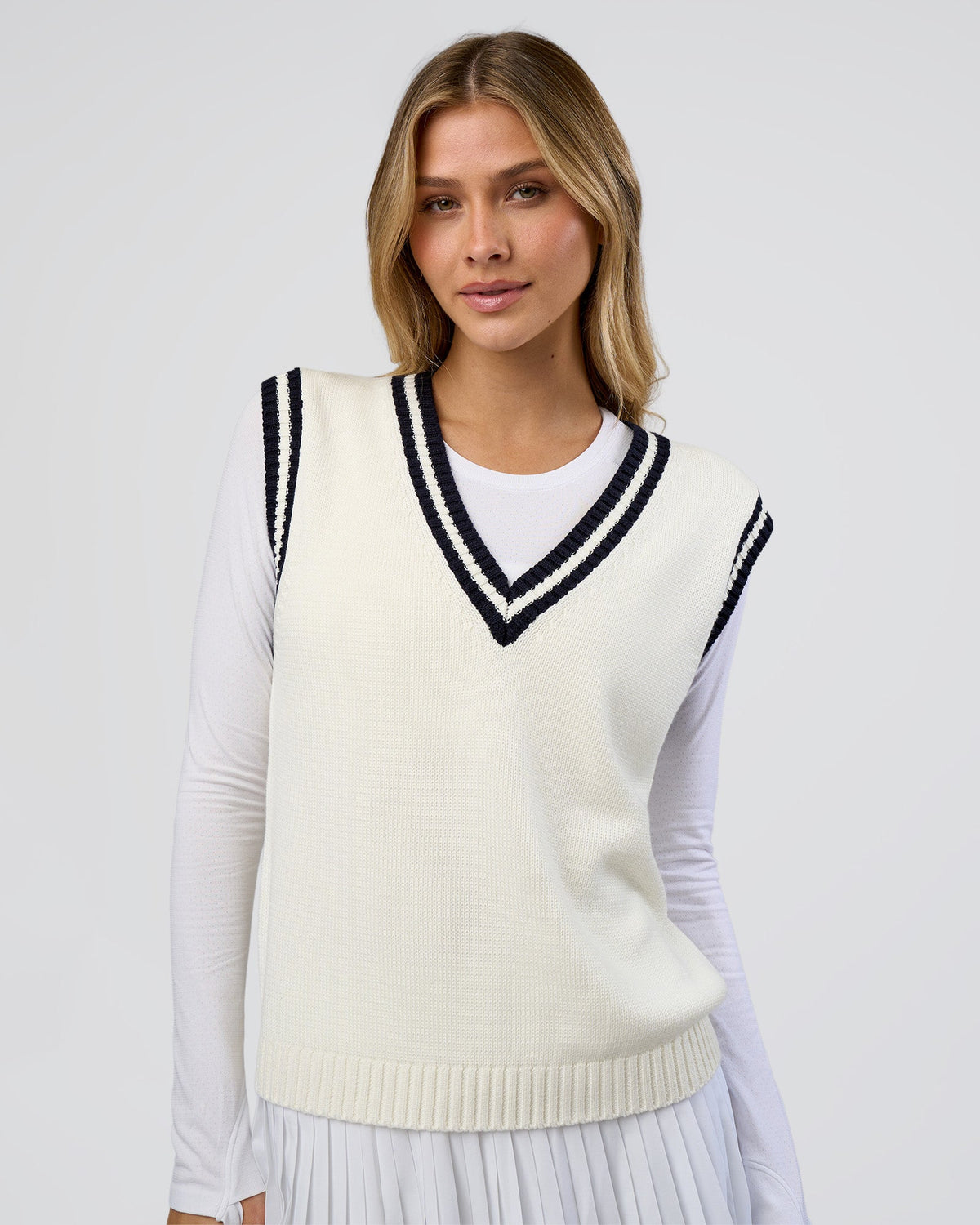 Woman wearing Clubhouse Vest - Off White-Future Navy | Model:Leilani | Size:XS - view 2