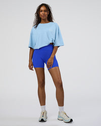 Woman wearing Coffee Run FLXCotton Oversized Tee - Open Air-White | Model:Jordan | Size:XS