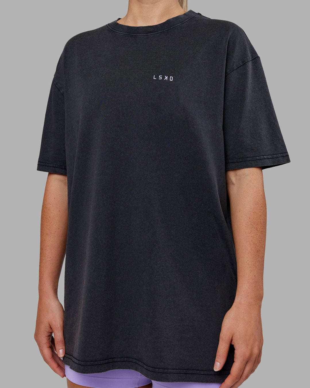 Woman wearing Dare To Think FLXCotton Tee Oversize - Black Washed-Violet Ray | Model:Neve | Size:XS