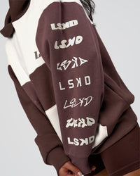 Woman wearing Deconstructed Fleece Hoodie - Off White-Cocoa Powder-Choc | Model:Loren | Size:XS