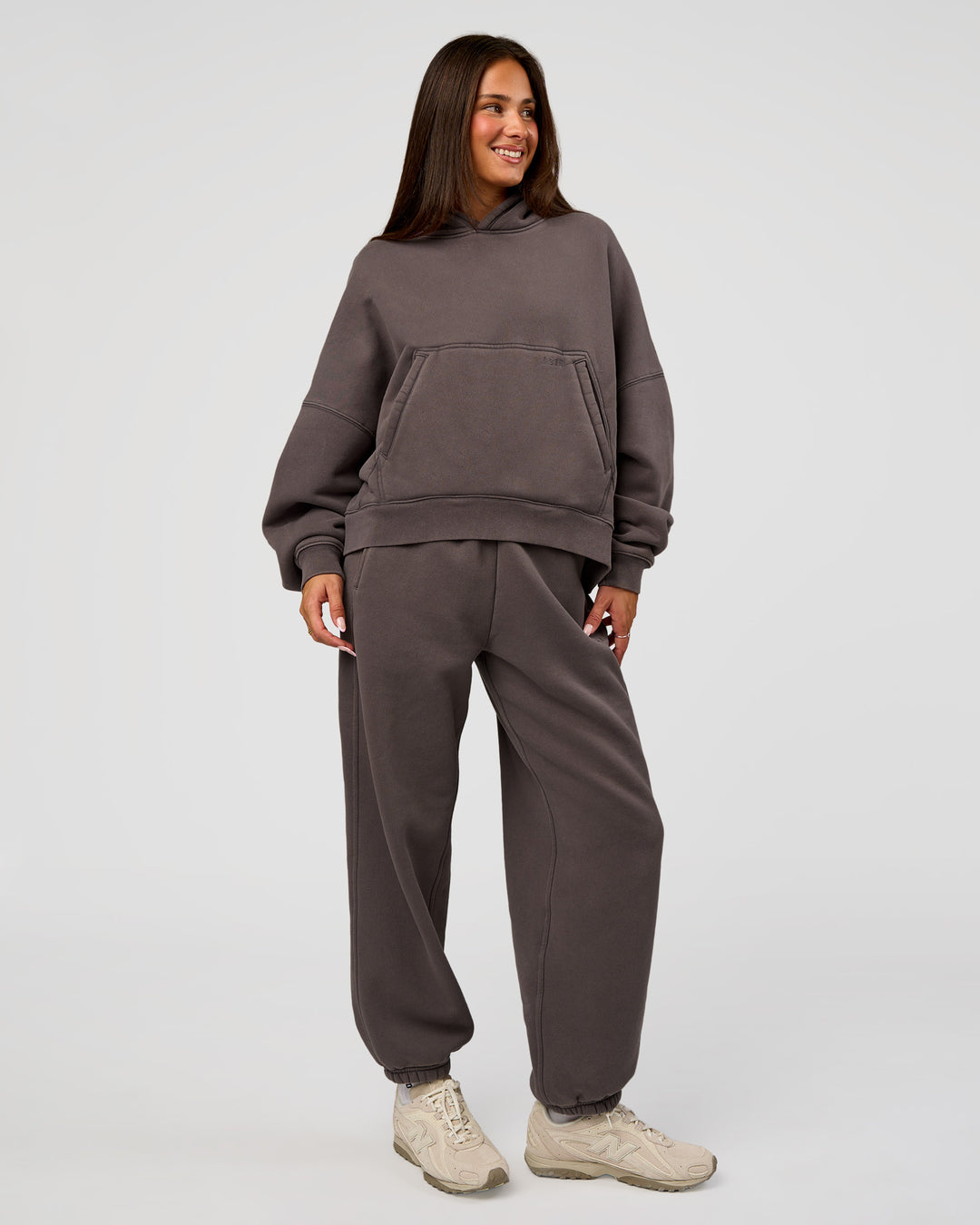 Woman wearing Distort Oversized Slouchy Fit Track Pant - Duskstone Washed | Model:Bianca | Size:XS
