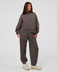 Woman wearing Distort Oversized Slouchy Fit Track Pant - Duskstone Washed | Model:Bianca | Size:XS