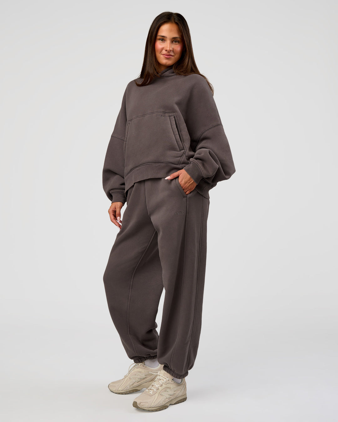 Woman wearing Distort Oversized Slouchy Fit Track Pant - Duskstone Washed | Model:Bianca | Size:XS