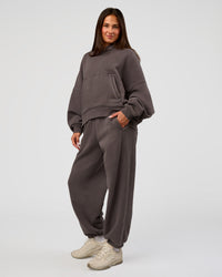 Woman wearing Distort Oversized Slouchy Fit Track Pant - Duskstone Washed | Model:Bianca | Size:XS